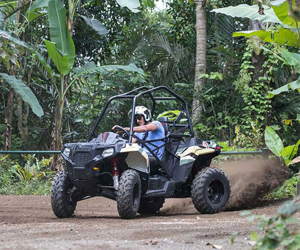 A man driving ATV in Bali jungle