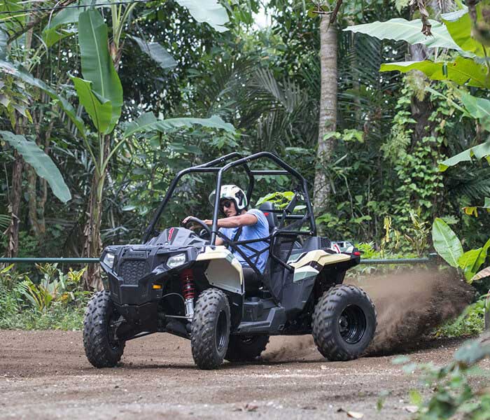 someone riding ATV in Bali jungle